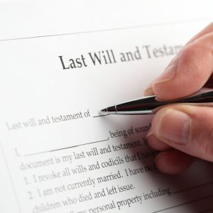 Last Will and Testament being signed 