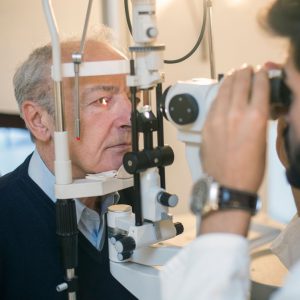 Older man getting an eye exam