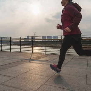 Person running outdoors in the city in cold weather