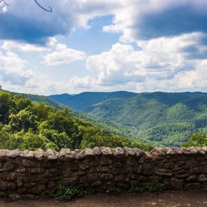 Green Mountains with stone wall in foreground