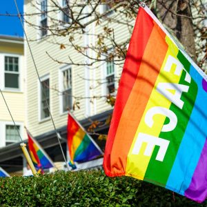 rainbow flag waves from a porch in P-town