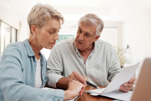 Senior couple discussing finances