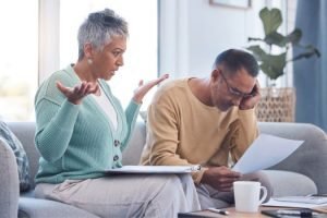Senior couple arguing over finances
