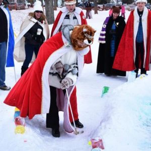 Man in costume with red robe at Saranac Lake
