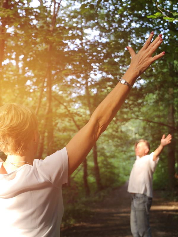 mature couple forest bathing