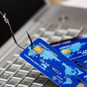 illustration of credit cards being dragged by fishing hook, like a lure 