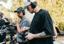 Your Next Binge: Documentaries Behind the scenes shots of production crew_bingeable documentaries featured image_courtesy of Kyle Loftus via Canva