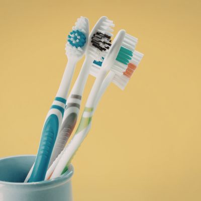 toothbrushes in toothbrush holder