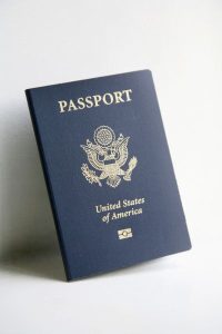 U.S. passport with biometric symbol on cover