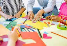 Crafting Retreats: The Inspirational Cure for Burnout and Boredom women around table working on crafts