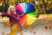 Living Healthier by Making Time for Curiosity, Creativity and Joy All work, no play. Featured image - woman joyously looking up in the midst of falling leaves